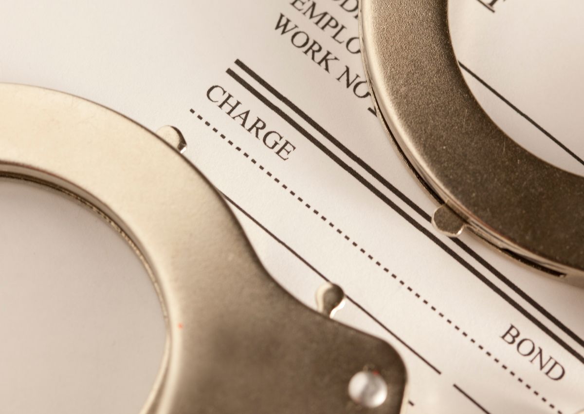 handcuffs over documents