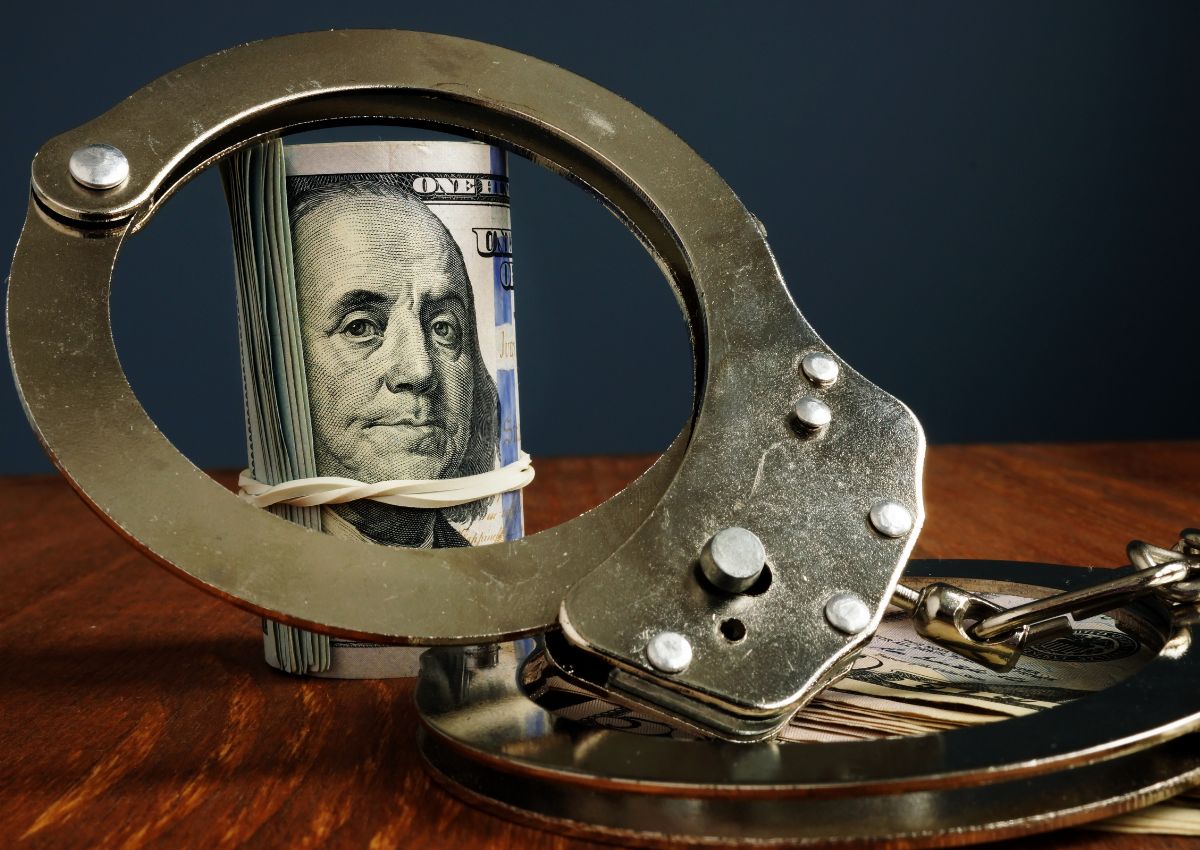 money and handcuffs